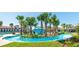 Enjoy the community lazy river surrounded by lush landscaping and a tropical cabana at 2483 Dubai St, Kissimmee, FL 34747