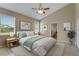 Comfortable bedroom featuring a large window for natural light and relaxing decor at 2625 Albion Ave, Orlando, FL 32833