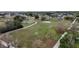 Aerial view of the community park that features a playground, baseball field, and a large open grassy area at 2625 Albion Ave, Orlando, FL 32833