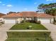 Charming single Gathering home boasting well-manicured lawn and barrel tile roof at 2625 Albion Ave, Orlando, FL 32833