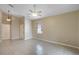 Living room featuring neutral colors, ceiling fan, and tile flooring at 2625 Albion Ave, Orlando, FL 32833