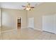 Main bedroom with tile flooring, large closets, and ensuite bathroom at 2625 Albion Ave, Orlando, FL 32833