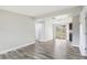 Open dining space featuring sliding glass doors, neutral walls, and elegant vinyl flooring at 2934 Truman Blvd, Sanford, FL 32771