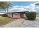 Charming single-story home with an attached carport and a concrete driveway leading to the entrance at 2934 Truman Blvd, Sanford, FL 32771