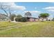 Spacious, well-maintained lawn surrounds this charming home, offering ample outdoor space at 2943 Truman Blvd, Sanford, FL 32771