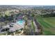 Aerial view of the golf course, community pool, and other amenities at 3819 Breckinridge Ln, Clermont, FL 34711