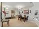 Elegant dining room featuring a modern chandelier and neutral tones at 3819 Breckinridge Ln, Clermont, FL 34711