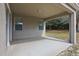 Covered patio with view to the backyard at 3819 Breckinridge Ln, Clermont, FL 34711