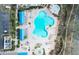 Aerial view of a resort-style pool and amenity area with cabanas and lounge chairs at 3819 Breckinridge Ln, Clermont, FL 34711