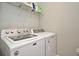 Functional laundry room with a modern washing machine and dryer at 3987 Silverstream Ter, Sanford, FL 32771