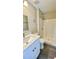 Clean bathroom featuring white vanity, shower, and modern fixtures at 425 Cadenza Dr, Orlando, FL 32807