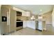 Stainless steel appliances, white cabinets, and modern finishes enhance this well-equipped kitchen at 425 Cadenza Dr, Orlando, FL 32807