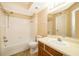 Bathroom featuring a vanity with sink, tile floor, shower and bathtub combo at 4536 Commander Dr # 1537, Orlando, FL 32822