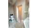 Bathroom with tiled walk-in shower, toilet, and large mirror at 459 Wood Rose Ln, Altamonte Springs, FL 32714