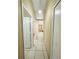 Hallway with white doors and a ceiling light, and a view of the front door at 459 Wood Rose Ln, Altamonte Springs, FL 32714