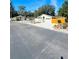 A view of the house from the street with its two-car garage and blue entry door at 459 Wood Rose Ln, Altamonte Springs, FL 32714