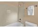 Simple, clean bathroom with tiled shower and toilet at 4804 Laddie Ct, Orlando, FL 32821