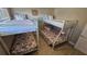 A kid-friendly bedroom with two sets of bunkbeds at 4831 Saxon Dr # 1130, New Smyrna Beach, FL 32169