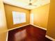 A bright bedroom with a window and hardwood floors at 5 W Harding St # E, Orlando, FL 32806