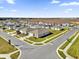 Aerial view of a neighborhood featuring single Gathering homes and well-maintained green spaces at 545 Jerry Ln, Haines City, FL 33844