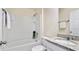 Bright bathroom featuring a shower-over-tub combination and granite countertop vanity at 545 Jerry Ln, Haines City, FL 33844