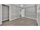 Bedroom featuring tiled floors, closet and neutral walls at 5844 Bamboo Dr, Orlando, FL 32807