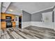 Well-lit kitchen with wood cabinets, stainless steel appliances, and backsplash at 5844 Bamboo Dr, Orlando, FL 32807