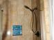 Tiled shower features niche for storage at 6501 Abercrombie Ct, Orlando, FL 32835