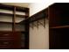 Walk-in closet features custom built-in shelves and drawers at 6501 Abercrombie Ct, Orlando, FL 32835