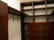 Walk-in closet features custom built-in shelves and drawers at 6501 Abercrombie Ct, Orlando, FL 32835