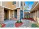 Cozy back patio area with stone pavers and a screened-in entry at 7217 Dr Phillips Blvd, Orlando, FL 32819