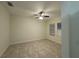 Bedroom featuring neutral walls, tile flooring, and a ceiling fan at 7606 Loon Ave, Winter Garden, FL 34787