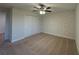 Charming bedroom with whimsical polka dot accent wall and closet at 7606 Loon Ave, Winter Garden, FL 34787