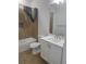 Bathroom featuring modern vanity, framed mirror, and combined bathtub with shower at 8266 Tavistock Lakes Blvd, Orlando, FL 32827