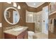 Modern bathroom with a stand-up shower, vanity, and tile floors at 10742 Boca Pointe Dr, Orlando, FL 32836