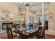 Large dining room area with hardwood floors, open floor plan and elegant decor at 10742 Boca Pointe Dr, Orlando, FL 32836
