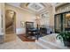 Open foyer featuring a dining area, stairs to the second floor, and black metal railings at 10742 Boca Pointe Dr, Orlando, FL 32836