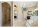 Beautiful bathroom with a walk-in shower and separate tub with neutral tones at 10742 Boca Pointe Dr, Orlando, FL 32836