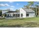 A view of the pool and screened lanai behind the house at 1109 Brownshire Ct, Longwood, FL 32779