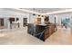 Spacious kitchen with black marble island, modern appliances, and pendant lighting at 1109 Brownshire Ct, Longwood, FL 32779