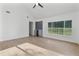 Bright living room with vaulted ceiling, large windows, and a built-in wet bar at 1109 Brownshire Ct, Longwood, FL 32779