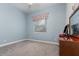 Neutral bedroom with carpeted floors, closet space, and one window at 1224 Shorecrest Cir, Clermont, FL 34711