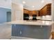 Bright kitchen with stainless steel sink and white quartz countertops provides an ideal workspace at 1224 Shorecrest Cir, Clermont, FL 34711