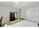 Cozy bedroom featuring a plush bed, sleek TV, and ample closet space at 1246 Pallister Ln, Lake Mary, FL 32746