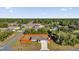 Aerial view of a single story home surrounded by a wooden fence and trees in a rural neighborhood at 13258 Sw 29Th Cir, Ocala, FL 34473