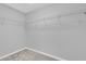 Empty walk-in closet with shelving ready for customization at 13258 Sw 29Th Cir, Ocala, FL 34473