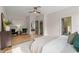 Spacious main bedroom with wood floors, natural light, and neutral tones at 13631 Guildhall Cir, Orlando, FL 32828