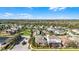 Aerial view of the neighborhood showcasing the houses, trees and landscape at 14101 Creekbed Cir, Winter Garden, FL 34787