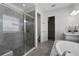 Beautiful bathroom featuring a large shower with glass door, soaker tub and double sinks at 14101 Creekbed Cir, Winter Garden, FL 34787