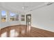 Sunlit main bedroom with a ceiling fan and sliding glass door to the pool at 14851 Oldham Dr, Orlando, FL 32826